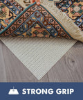 Natural Rubber Rug Grip Non Slip Pad 3 By 5 Inch Low Profile Rug Pad under a decorative rug on hardwood floor.