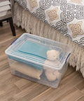 Premium Clear Wheeled Storage Bins With Lids Heavy Duty Stackable Plastic Containers Bpa Free holding soft toys and blankets under a bed.