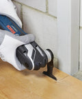 Worker using oscillating tool with 5 Piece Starlock Oscillating Multi Tool Blade Set For Metal Wood And General Materials