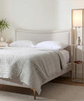 Cozy Rustic Wood Shelf Floor Lamp With Shade And Built-In 9W LED Bulb beside bed in modern bedroom