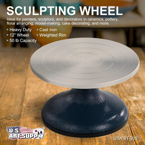 Front view of US Art Supply sculpting wheel, 7-inch silver disc on a dark blue metal base
