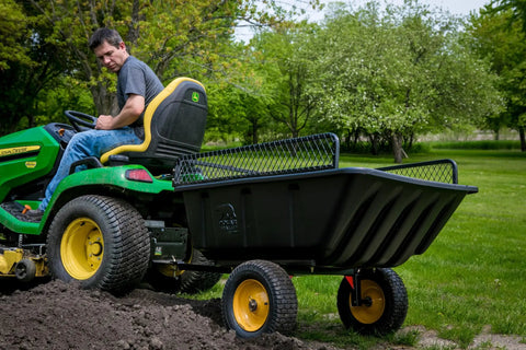 Heavy Duty Lawn And Garden Trailer With 900 Lb Capacity 15 Cu Ft Poly Tub attached to lawn tractor