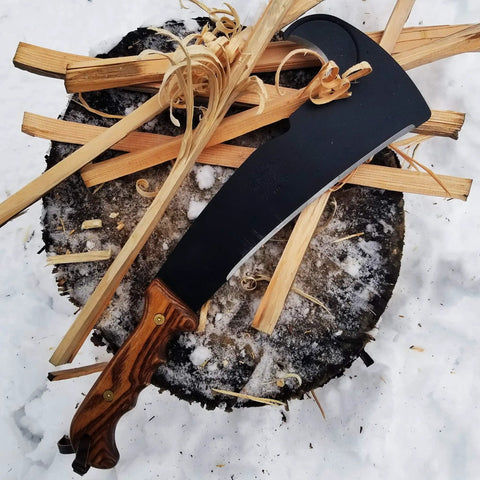 All In One Survival Machete And Brush Axe With Sheath For Camping Fishing Hunting And Bushcraft A Heavy Duty Outdoor Tool Built For Brush Clearing Digging And Trail Work on wooden stump
