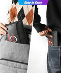 Person inserting Fireproof And Water Resistant Silicone Coated Safe Storage Bag into a backpack and a pocket.