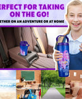 Girl holding Demon Hunters 30 Ounce Tumbler with Straw and Handle, insulated stainless steel travel mug, in car showcased for versatility.
