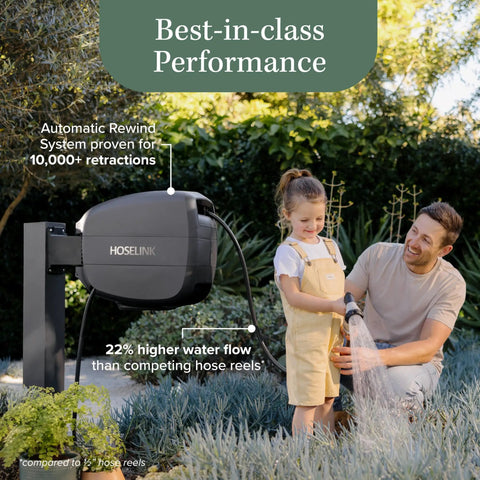 Man and child using Evolve Charcoal 100ft Retractable Garden Hose Reel With Auto Rewind Wall Mounted 180 Degree Swivel in a yard.