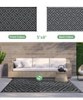 Durable 5x8 Outdoor Rug For Patio And RV Use, Waterproof Reversible Plastic Mat with black and gray geometric design on patio