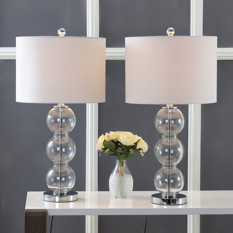 Clear Glass Triple Sphere Table Lamps Set Of Two With Chrome Finish And Super Sleek White Linen Shade For Living Room Bedroom Or Office 27 Inch Tall Bedside Lamps LED Bulbs Included And ETL Listed displayed on a table with flowers.