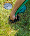 Hand connecting hose to In Ground Impact Sprinkler With Click N Go Hose Connect For Quick Install Lawn Irrigation No Fuss Pops Up