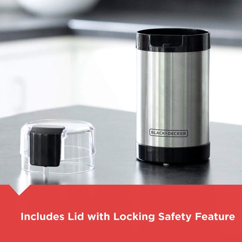 One Touch Coffee And Spice Grinder With Stainless Steel Blades And Bowl Two Thirds Cup Capacity Powerful 150 Watt Motor Quick Even Grinds For Coffee Beans Herbs Grains And Spices Easy Push Button Control with lid shown on kitchen counter