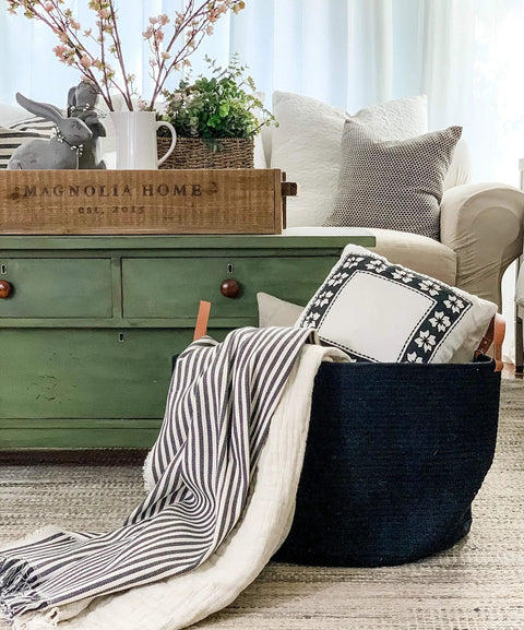 Black Cotton Rope Storage Basket With Real Leather Handles Big 20x13 Inch Blanket And Toy Organizer in living room.