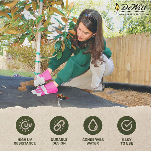 Woman installing Heavy-Duty Weed Barrier Fabric 4 By 100 Feet Breathable Woven Polypropylene for landscaping and gardening.
