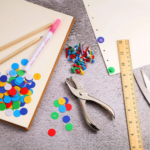 All In One Dope Craft Fasteners Set From Mudder With 100 Brass Paper Fasteners And 300 Colorful Washers Plus 1 Hole Punch For Scrapbooking DIY Projects And School Supplies shown with paper and tools.