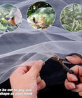 Ultra Fine Garden Netting For Insects And Birds Keeps Bugs And Critters Out While Letting Air Light And Water In Large 4x25 Ft Mesh Plant Cover being cut with scissors