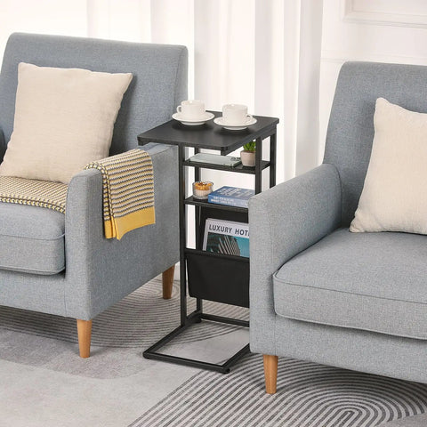 C Shaped End Table With Three Tiers And Storage Bag Easily Slides Under Sofa Or Bed Space Saving Couch Table displayed between armchairs.