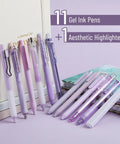 Pastel Purple Gel Pen Set 12 Pack With One Matching Highlighter Black Ink 0.5mm Fine Point Smooth Gel Pens For Journaling School And Office Aesthetic Girly Stationery displayed with journal and notebooks.