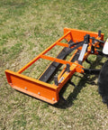 Heavy Duty 72 Inch Tractor Land Leveler Scraper Grader Attachment With Dual Cutting Edges Adjustable Shanks 3 Point Cat 1 Hitch on grass