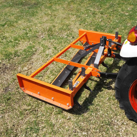 Heavy Duty 72 Inch Tractor Land Leveler Scraper Grader Attachment With Dual Cutting Edges Adjustable Shanks 3 Point Cat 1 Hitch on grass