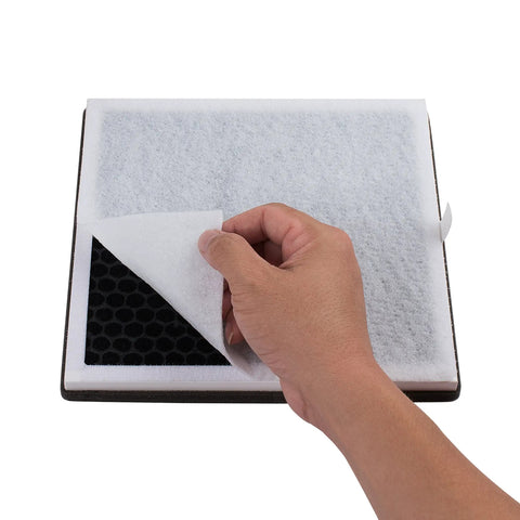 Hand lifting pre-filter sheet from Go To Replacement Filter For PureZone PEAIRPLG Air Purifier With 3 In 1 H13 High Efficiency Filter