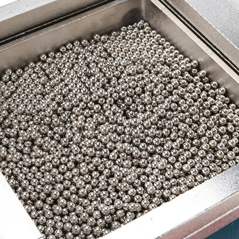 Close-up of steel balls used in Pro Grade Vacuum Forming Machine 110V Lab Equipment with aluminum body for cooling efficiency.
