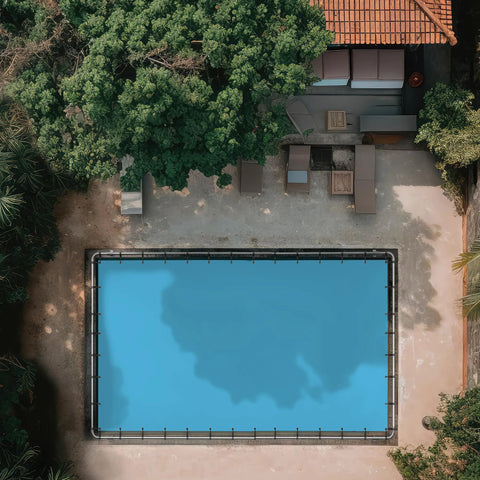 Beefy Heavy Duty Waterproof Tarp 16 By 20 Feet 12 Mil Thick Blue Tarpaulin UV Resistant Rip And Tear Proof covering a rectangular pool