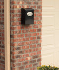 Locking Wall Mount Mailbox In Black Galvanized Steel With Medium Capacity on brick wall, heavy duty powder coated finish, weather resistant.