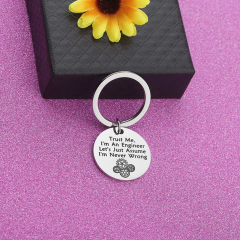 Trust Me I Am An Engineer Keychain With Gear Design on gift box, dainty stainless steel charm, motivational accessory for techies.