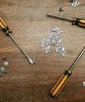 Aluminum Blind Rivets Kit 200 Piece With Dome Drive Heads surrounded by screwdrivers on wooden workshop table