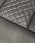 Close-up of quilted leather detailing on Leather Power Recliner Sofa Set With LED Ambient Lighting Three Piece Home Theater Seating.
