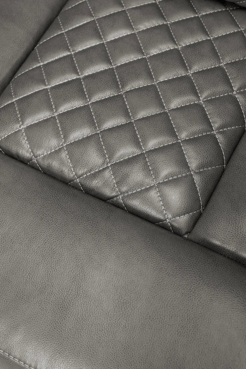 Close-up of quilted leather detailing on Leather Power Recliner Sofa Set With LED Ambient Lighting Three Piece Home Theater Seating.