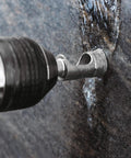 Diamond Welded Tip 1 Inch Drill Bit For Tile And Porcelain in action with water feed on stone surface