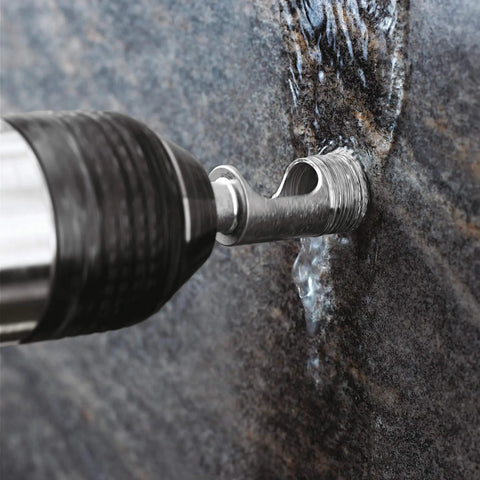 Diamond Welded Tip 1 Inch Drill Bit For Tile And Porcelain in action with water feed on stone surface