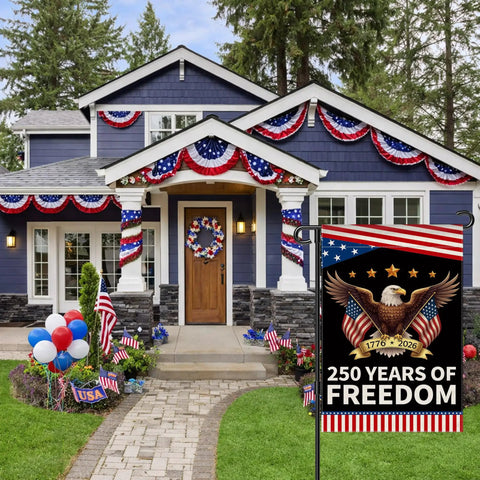 Patriotic Garden Flag Celebrating 250 Years Of Freedom With Eagle Design For Fourth Of July Double Sided Waterproof 12 By 18 Inch USA Flag Banner in front of a decorated house with bunting and balloons.