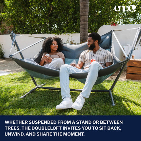 Couple relaxing on DoubleLoft Hammock Chair for Two Cozy and Comfortable With Cushioned Arm and Leg Rests, Side By Side Seating