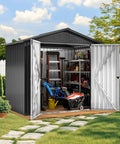 6x4 Ft Metal Outdoor Shed With Lockable Doors, filled with tools, against white fence, sloped roof, dark gray, backyard view