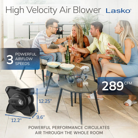 Group enjoying drinks with 12-Inch Portable Utility Fan With Pivoting High Velocity Air, 289 CFM, Three Speeds in room, black