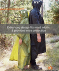 Two adults wearing Ultra Lightweight Ripstop Nylon Rain Poncho With Adjustable Hood Camouflage Pattern in forest setting