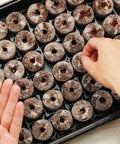 Hand planting seeds in 72 Coconut Coir Seed Starter Pellets Kit With Humidity Dome And Watertight Tray 35mm Peat Free Pellets