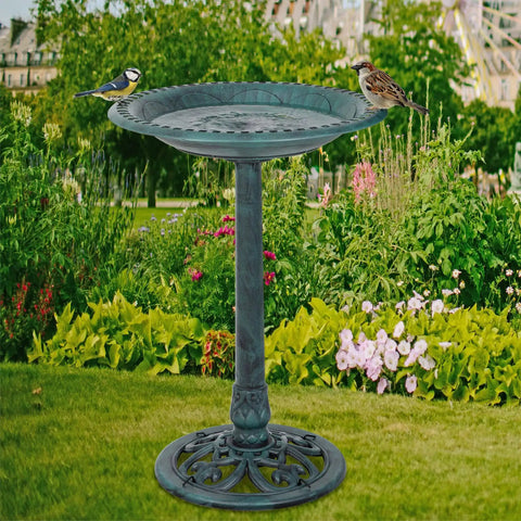 28 Inch Height Polyresin Bird Bath With Antique Verdigris Finish, Weather Resistant Pedestal Garden Decor, Fleur De Lys Accent Bowl, installed in garden with birds