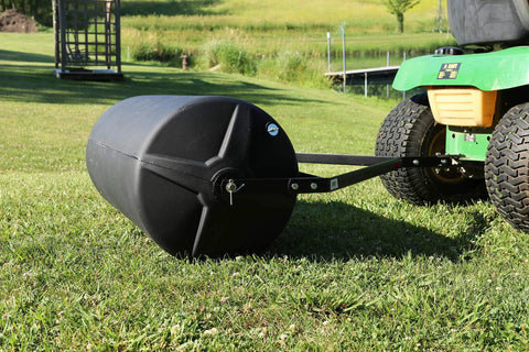 Tow Behind Lawn Roller 18-Inch By 36-Inch Heavy Duty Poly Roller With 40 Gallon Capacity attached to lawn tractor