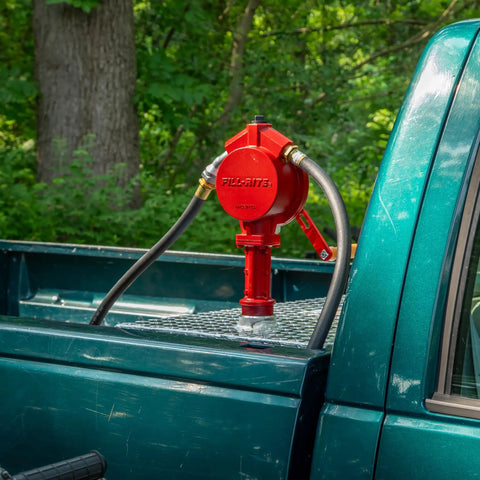 Manual Fuel Transfer Rotary Hand Pump With Reversible Flow No Power Needed, Grab-and-Go Portable Tool For Fueling Or Draining Vehicle Tanks, Discharge Hose, Straight Spout, Vacuum Breaker, Suction Pipe, Theft Prevention Design on truck bed