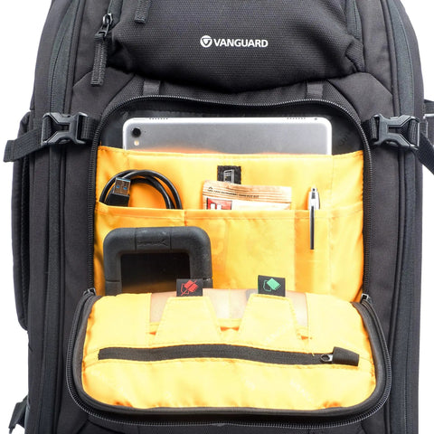Interior view of Eight Wheel Spinner Camera Backpack For DSLRs And Gear With Tuckaway Harness, showing organized pockets.