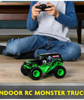 Child playing with Awesome Grave Digger RC Monster Truck 1:24 Scale 2.4 GHz RC Vehicle For Kids 4 And Up Realistic Die Cast Look
