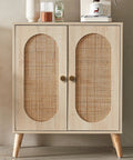 Wooden cabinet with cane paneling and two antique brass knobs, fits the style of Antique Brass Cabinet Knob And Drawer Pulls Set.