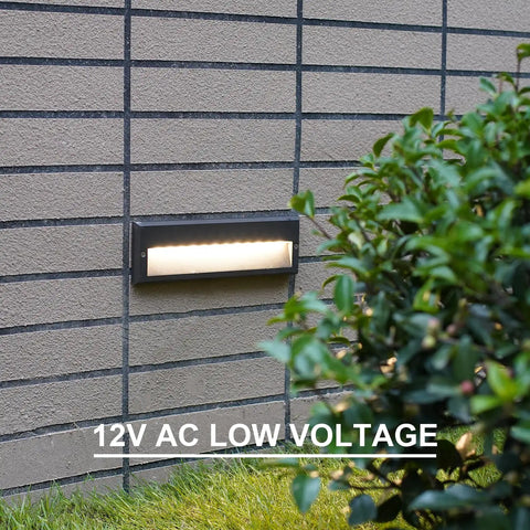 Low Voltage Outdoor Step Lights Kit 12V AC Landscape Stair Lighting 8 Pack on garden wall with bushes