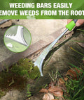 Crack Weeder With L Shaped Blade And Soft Grip Stainless Steel Handle For Effortless Root Pulling And Removal In Garden Lawn Yard Patio And Paving Crevice Scraper Tool in use on mossy patio cracks