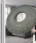 Hella Tough Weather Stripping Brush Door Seal Strip For Sliding Windows And Doors Cut To Fit, flexible polypropylene roll in hand.
