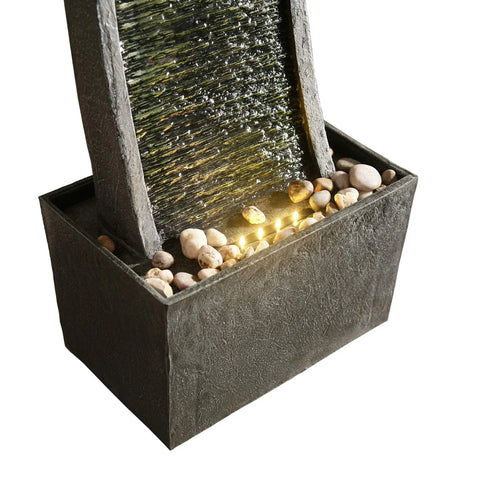Curved Faux Slate Waterfall Fountain with LED Light Accents for Indoor or Outdoor Use, easy setup, modern black base with gray stone design.