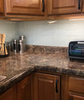 Kitchen showing Easy DIY Peel and Stick Glass Backsplash Tiles for Kitchen or Bathroom, Subway White 3x6 Inch Glass Tiles installed