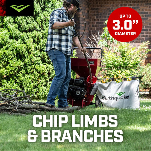 Person using Heavy Duty 212cc 4 Cycle Chipper Shredder With 20 To 1 Reduction Turns Branches Up To 3 Inches Into Mulch in garden